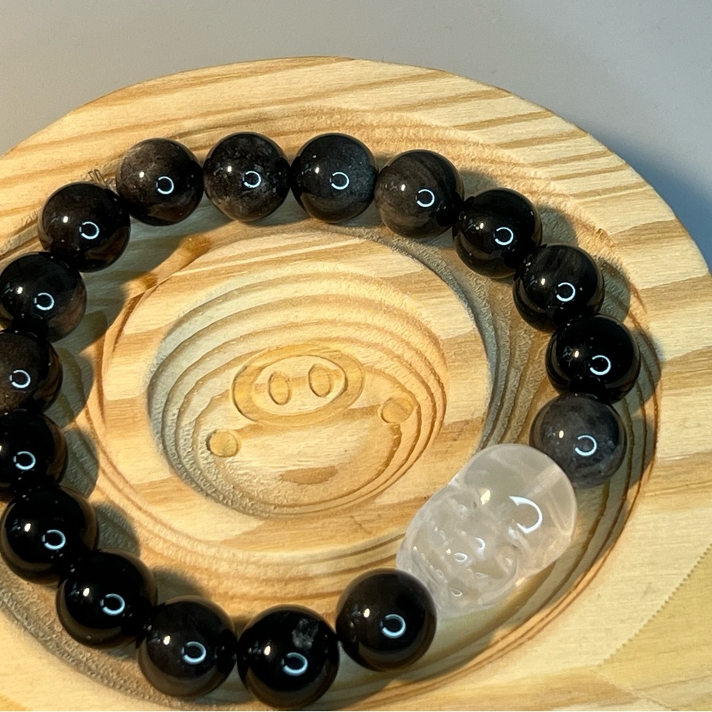Silver Obsidian 5+ with a white crystal pixiu 5+ x 13+ that brings good luck